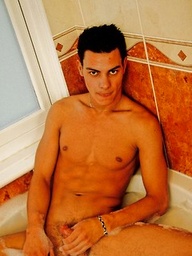 Sexy twink Tino takes a bath and then a shower and shows off his long boy-cock.