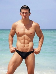 Sexy Zack Johnathan shows off his body on the beach