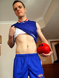 Aussie boy Brent Tyler strips of of his Footy Gear