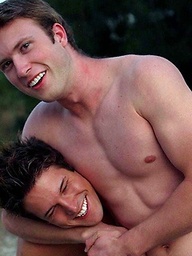 Two hot studs posing outdoors