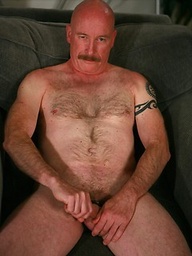 Bald daddy Dan Bennett jacking off dick