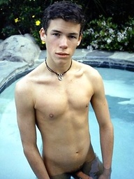 Cute twink blows a hot creamy load all over himself pool side.